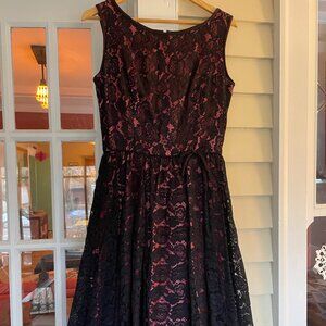 Vintage 1950s black lace dress with raspberry lining